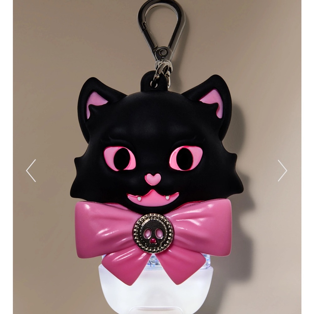 Light-Up Creepy Cat Black Cat Keychain with Pink Bow Sanitizer Holder